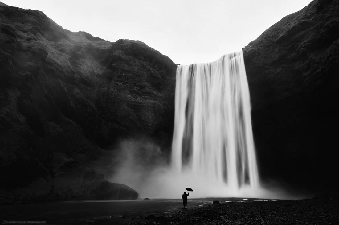 Umbrella Man at Skógafoss