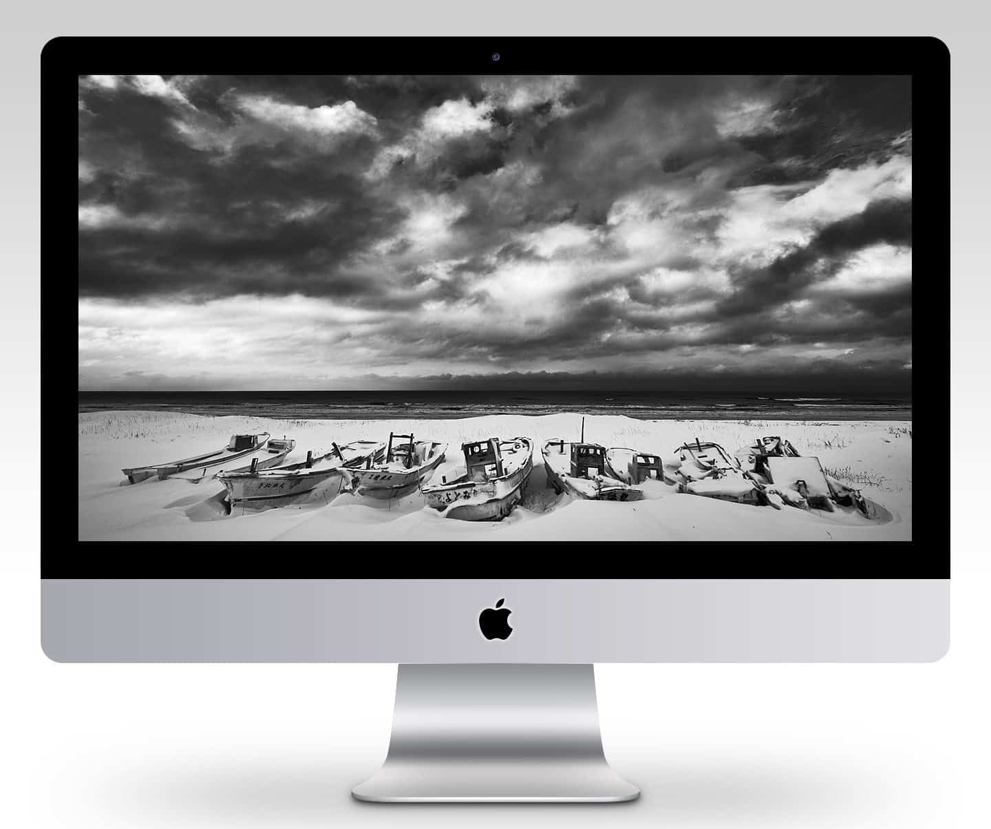 Boat Graveyard with Dramatic Sky Wallpaper